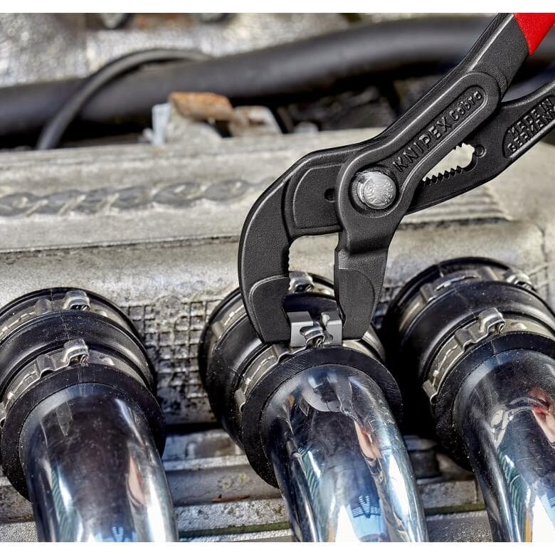 Atsperes šļūteņu skavu knaibles ar fiksatoru KNIPEX