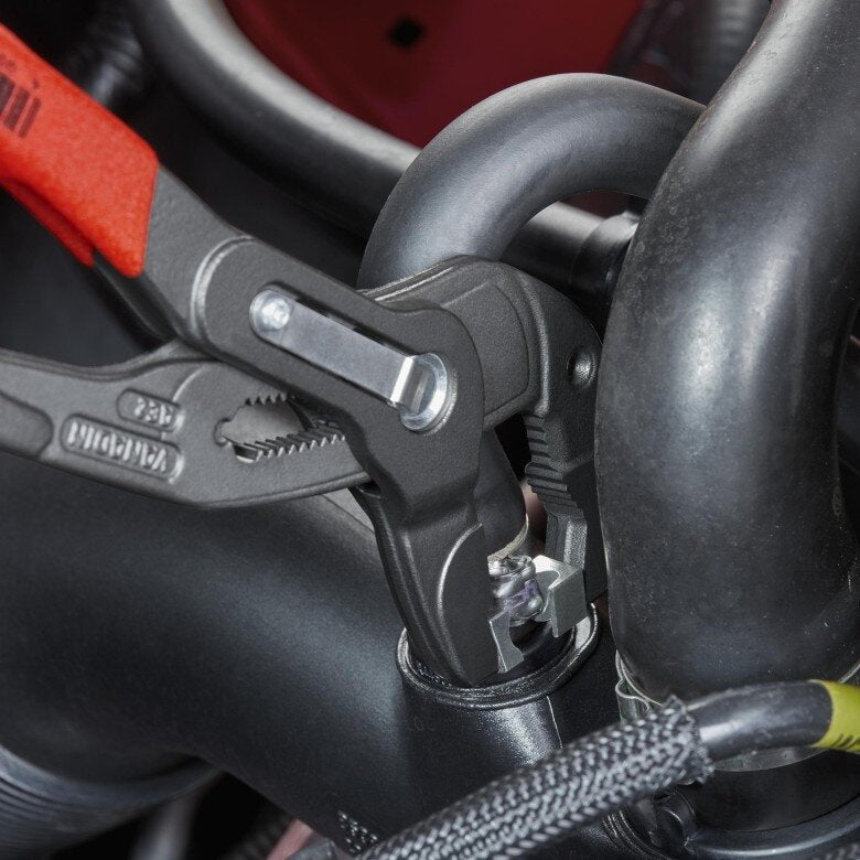 Atsperes šļūteņu skavu knaibles ar fiksatoru KNIPEX